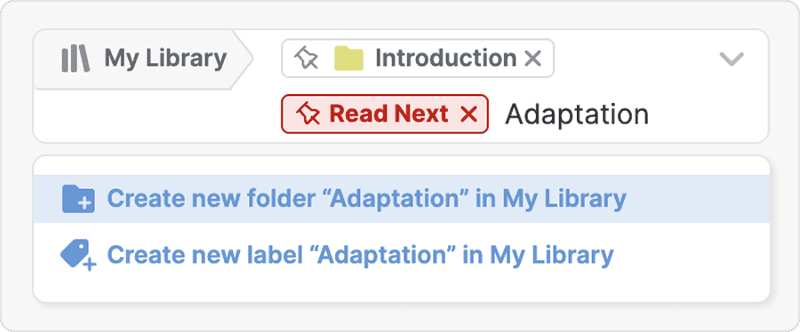 The popup’s destination selector with the Introduction folder and Read Next label already added and “Adaptation” being typed, offering “Create new folder” and “Create new label” for that name.